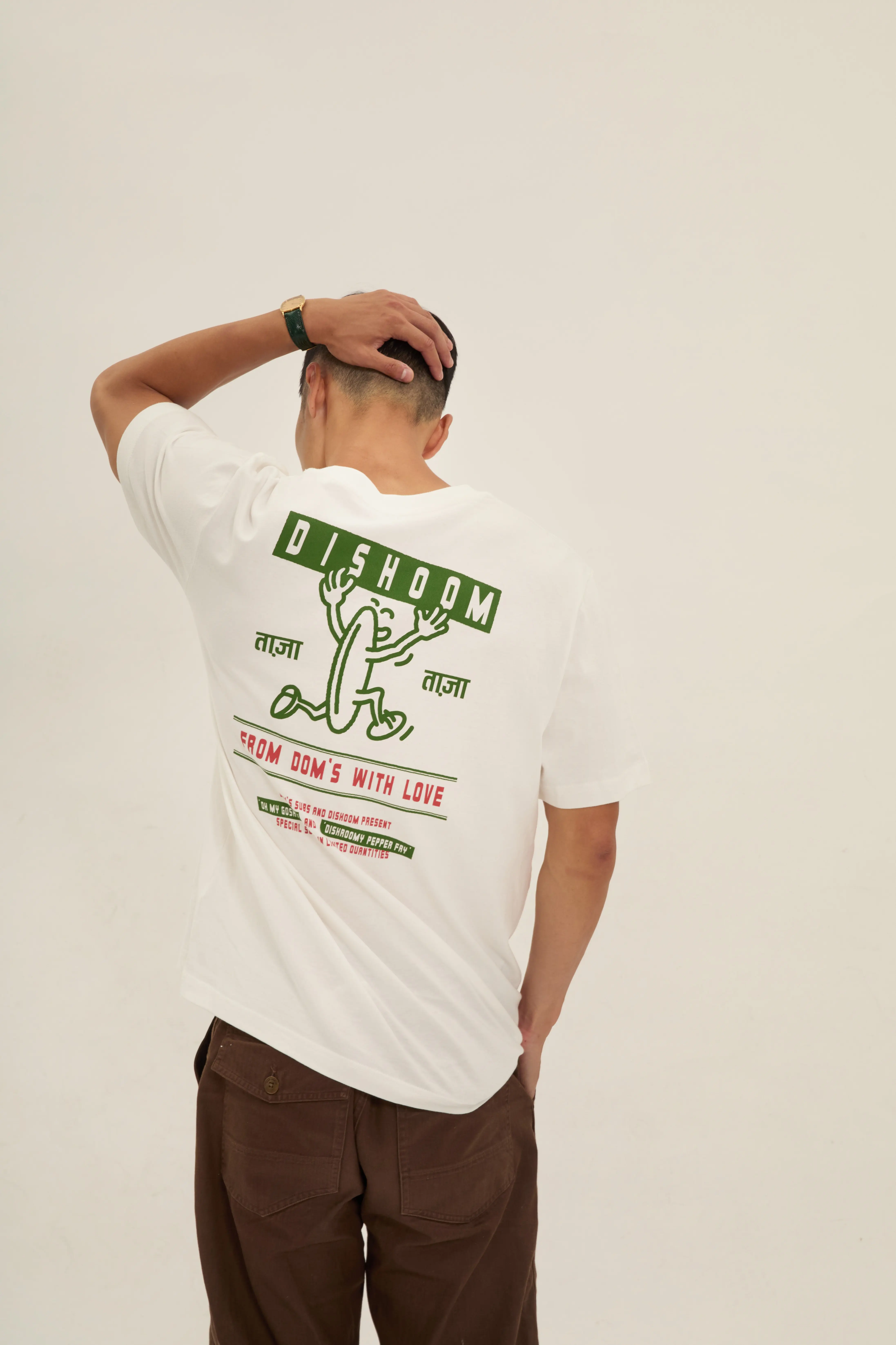 Person wearing branded cap